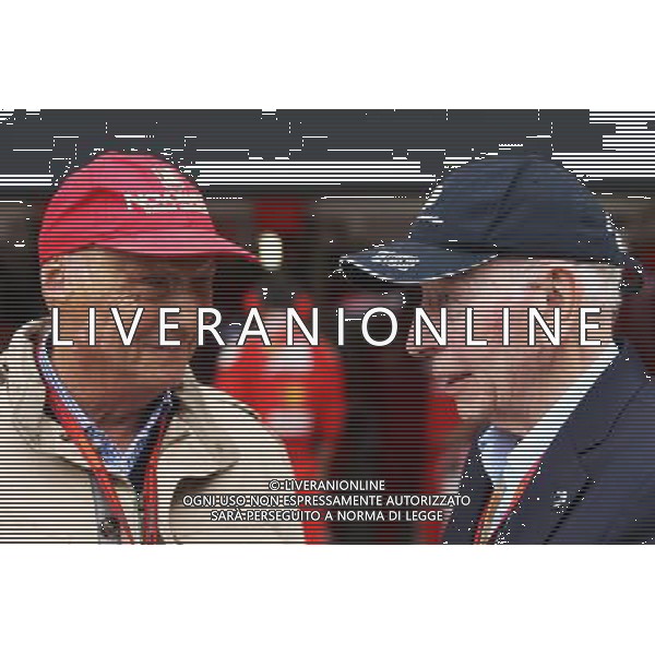 (L to R): Niki Lauda (AUT) Mercedes Non-Executive Chairman with John Surtees (GBR). 10.07.2016. Formula 1 World Championship, Rd 10, British Grand Prix, Silverstone, England, Race Day. / AGENZIA ALDO LIVERANI SAS - ITALY ONLY EDITORIAL USE ONLY