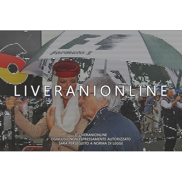 Bernie Ecclestone (GBR) with a grid girl on the grid. 10.07.2016. Formula 1 World Championship, Rd 10, British Grand Prix, Silverstone, England, Race Day. / AGENZIA ALDO LIVERANI SAS - ITALY ONLY EDITORIAL USE ONLY