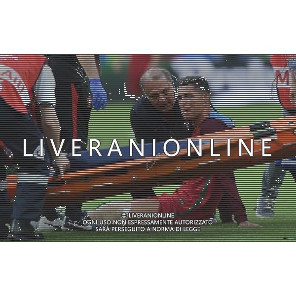 UEFA Francia EURO 2016 Final Tournament Final Parigi Saint-Denis - 10.07.2016 Portogallo-Francia Nella Foto: cristiano ronaldo a terra sofferente e dolorante dopo l\'infortunio, esce dal campo in barella e in lacrime /Ph.Vitez-Ag. Aldo Liverani