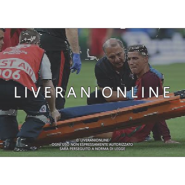 UEFA Francia EURO 2016 Final Tournament Final Parigi Saint-Denis - 10.07.2016 Portogallo-Francia Nella Foto: cristiano ronaldo a terra sofferente e dolorante dopo l\'infortunio, esce dal campo in barella e in lacrime /Ph.Vitez-Ag. Aldo Liverani