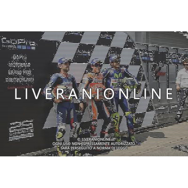 16.07.2016. Sachsenring, Germania. Hector Barbera, Marc Marquez e Valentino Rossi durante il parco chiuso. - Motomondiale ©PIAZZOLLA/AGENZIA ALDO LIVERANI SAS