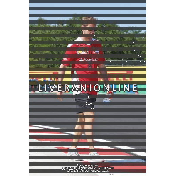 Sebastian Vettel (GER) Ferrari walks the circuit. 21.07.2016. Formula 1 World Championship, Rd 11, Hungarian Grand Prix, Budapest, Hungary, Preparation Day. AG ALDO LIVERANI SAS ONLY ITALY