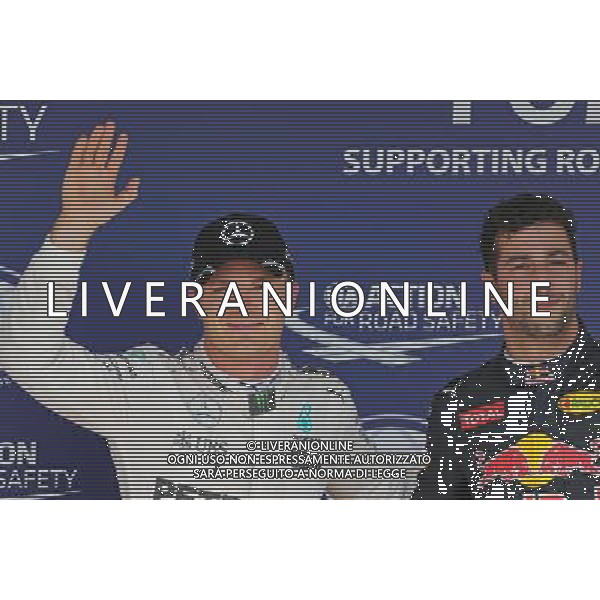 Nico Rosberg (GER), Mercedes AMG F1 Team and Daniel Ricciardo (AUS), Red Bull Racing 23.07.2016. Formula 1 World Championship, Rd 11, Hungarian Grand Prix, Budapest, Hungary, Qualifying Day. AG ALDO LIVERANI SAS ONLY ITALY