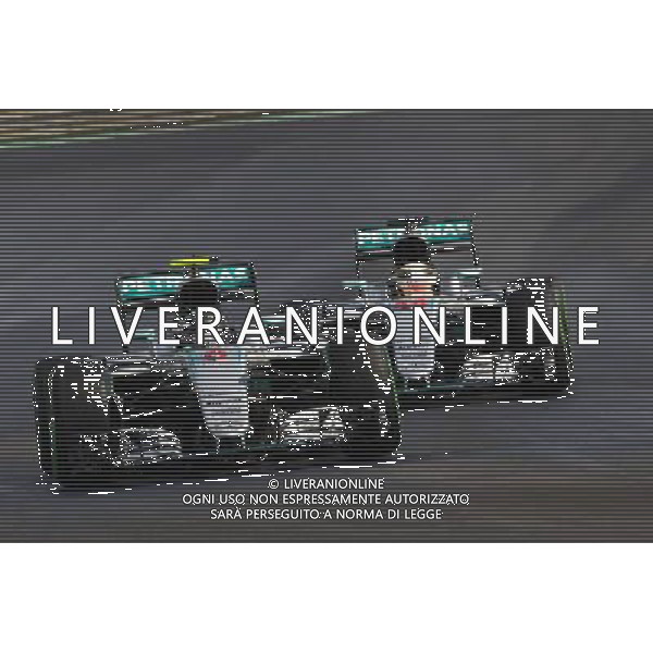 Nico Rosberg (GER) Mercedes AMG F1 W07 Hybrid leads team mate Lewis Hamilton (GBR) Mercedes AMG F1 W07 Hybrid. 23.07.2016. Formula 1 World Championship, Rd 11, Hungarian Grand Prix, Budapest, Hungary, Qualifying Day. AG ALDO LIVERANI SAS ONLY ITALY
