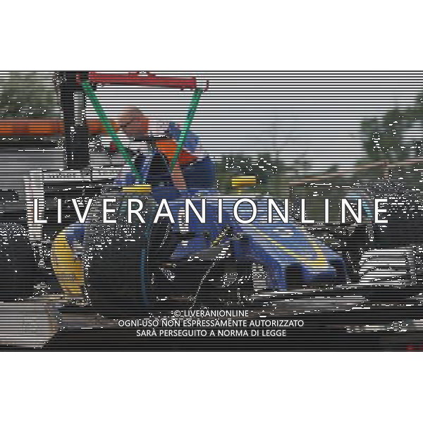 The damaged Sauber C35 of Marcus Ericsson (SWE) Sauber F1 Team is recovered back to the pits on the back of a truck during qualifying. 23.07.2016. Formula 1 World Championship, Rd 11, Hungarian Grand Prix, Budapest, Hungary, Qualifying Day. AG ALDO LIVERANI SAS ONLY ITALY