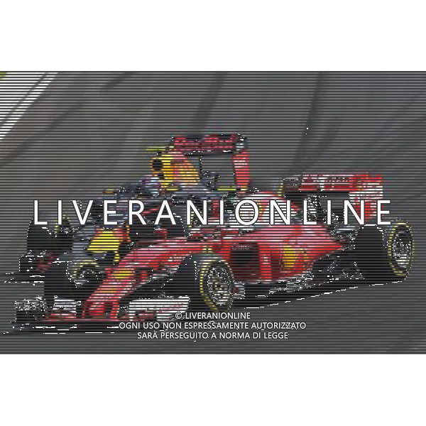 Kimi Raikkonen (FIN) Ferrari SF16-H and Max Verstappen (NLD) Red Bull Racing RB12 battle for position. 24.07.2016. Formula 1 World Championship, Rd 11, Hungarian Grand Prix, Budapest, Hungary, Race Day. /AGENZIA ALDO LIVERANI Sas - ITALY ONLY EDITORIAL USE ONLY - GP F1 Ungheria Gara