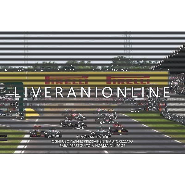 (L to R): Max Verstappen (NLD) Red Bull Racing RB12; Lewis Hamilton (GBR) Mercedes AMG F1; Nico Rosberg (GER) Mercedes AMG F1; and Daniel Ricciardo (AUS) Red Bull Racing battle for the lead at the start of the race. 24.07.2016. Formula 1 World Championship, Rd 11, Hungarian Grand Prix, Budapest, Hungary, Race Day. /AGENZIA ALDO LIVERANI Sas - ITALY ONLY EDITORIAL USE ONLY - GP F1 Ungheria Gara