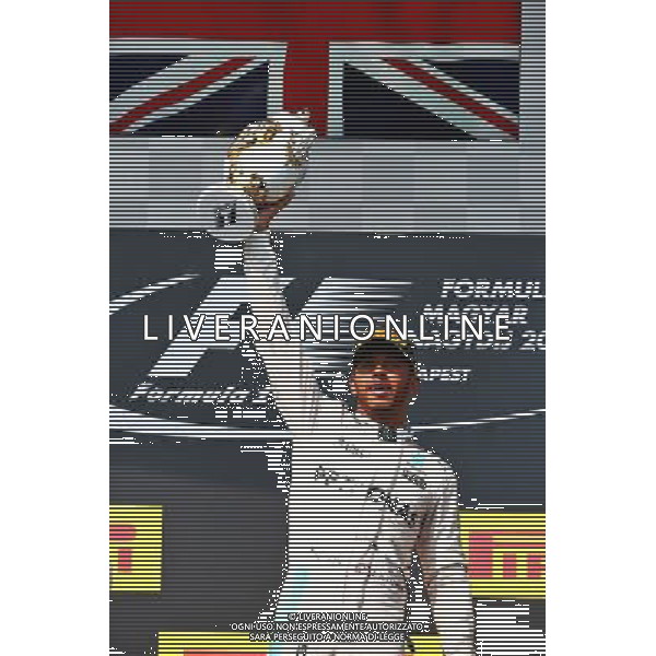 Race winner Lewis Hamilton (GBR) Mercedes AMG F1 celebrates on the podium. 24.07.2016. Formula 1 World Championship, Rd 11, Hungarian Grand Prix, Budapest, Hungary, Race Day. /AGENZIA ALDO LIVERANI Sas - ITALY ONLY EDITORIAL USE ONLY - GP F1 Ungheria Gara