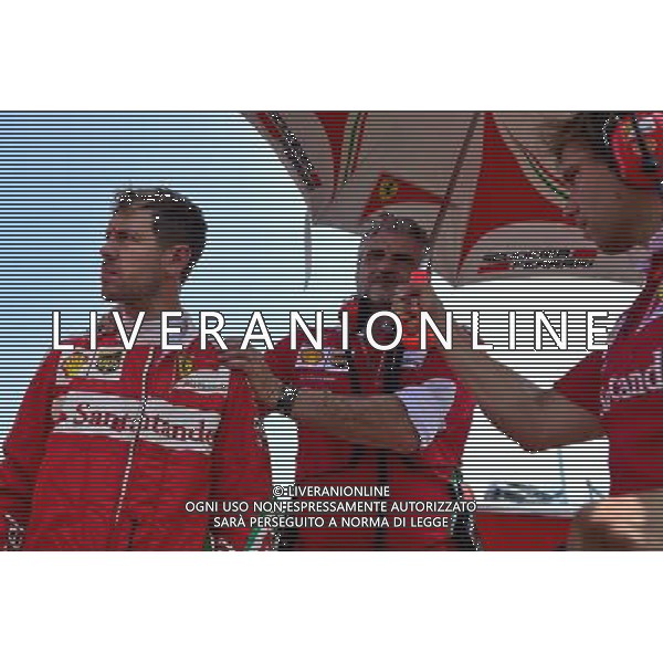 Sebastian Vettel (GER) Ferrari with Maurizio Arrivabene (ITA) Ferrari Team Principal on the grid. 24.07.2016. Formula 1 World Championship, Rd 11, Hungarian Grand Prix, Budapest, Hungary, Race Day. ag aldo liverani sas onlyitaly