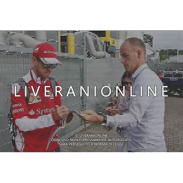 Sebastian Vettel (GER) Ferrari signs autographs for the fans. 29.07.2016. Formula 1 World Championship, Rd 12, German Grand Prix, Hockenheim, Germany, Practice Day. AG ALDO LIVERANI SAS ONLY ITALY AG ALDO LIVERANI SAS ONLY ITALY