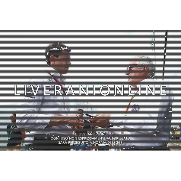 (L to R): Toto Wolff (GER) Mercedes AMG F1 Shareholder and Executive Director with Charlie Whiting (GBR) FIA Delegate. 30.07.2016. Formula 1 World Championship, Rd 12, German Grand Prix, Hockenheim, Germany, Qualifying Day. AG ALDO LIVERANI SAS ONLY ITALY