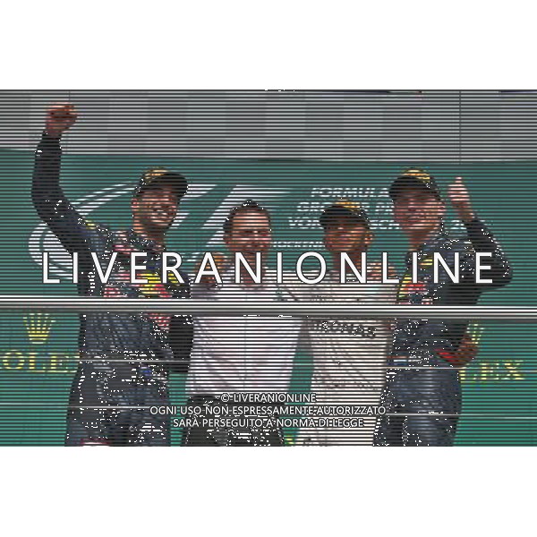 The podium (L to R): Daniel Ricciardo (AUS) Red Bull Racing, second; Lewis Hamilton (GBR) Mercedes AMG F1, race winner; Max Verstappen (NLD) Red Bull Racing, third. 31.07.2016. Formula 1 World Championship, Rd 12, German Grand Prix, Hockenheim, Germany, Race Day. AG ALDO LIVERANI SAS ONLY ITALY