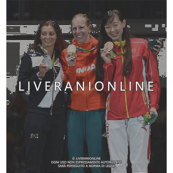 XXXI Olympic Games Giochi Olimpici Rio 2016 Rio de Janeiro - 06.08.2016 Finale Individuale Donne di Spada Nella Foto:Szasz Emese (HUN) - Fiamingo Rossella (ITA)- Sun Yiven (CHN) Podio /Ph.Vitez-Ag. Aldo Liverani