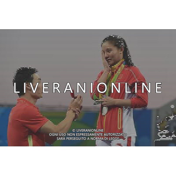 XXXI Olympic Games Giochi Olimpici Rio 2016 Rio de Janeiro - 14.08.2016 Finale Tuffi Trampolino 3m Femminile Nella Foto:Proposta di matrimonio a He Zi dopo la premiazione /Ph.Vitez-Ag. Aldo Liverani