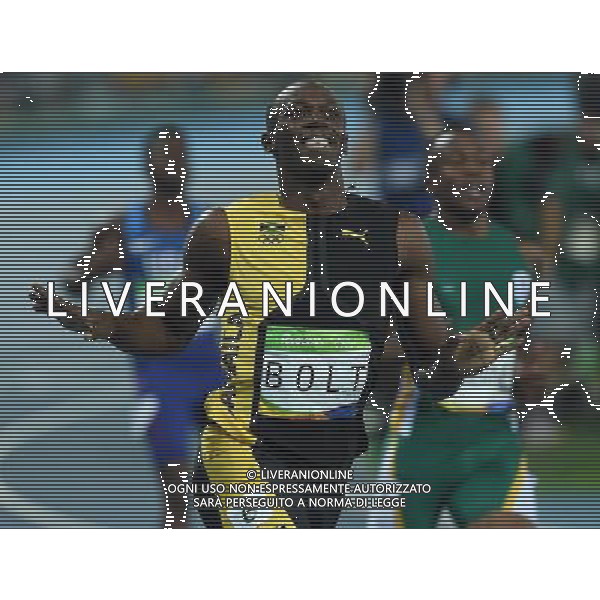 XXXI Olympic Games Giochi Olimpici Rio 2016 Rio de Janeiro - 14.08.2016 Atletica Finale 100m di corsa Maschili Nella Foto:Usain Bolt vince i 100m su Gatlin Justin e de Grasse Andre /Ph.Vitez-Ag. Aldo Liverani