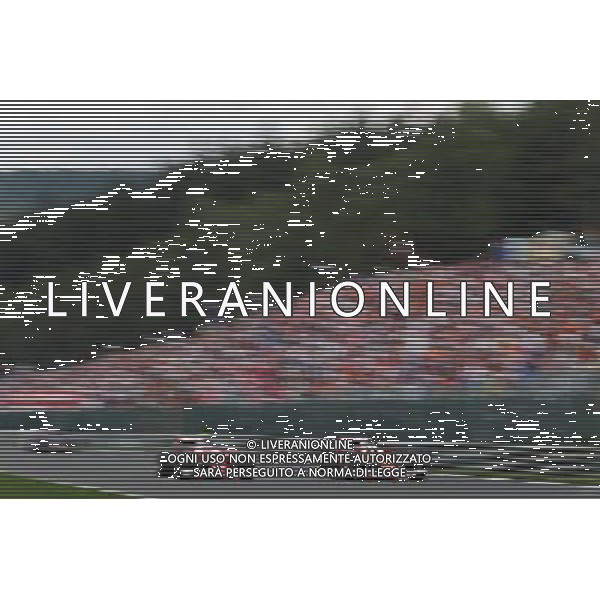 (L to R): Kimi Raikkonen (FIN) Ferrari SF16-H with team mate Sebastian Vettel (GER) Ferrari SF16-H. 28.08.2016. Formula 1 World Championship, Rd 13, Belgian Grand Prix, Spa Francorchamps, Belgium, Race Day. / AGENZIA ALDO LIVERANI SAS - ITALY ONLY EDITORIAL USE ONLY
