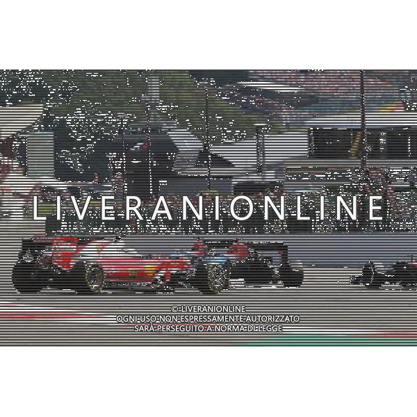 Sebastian Vettel (GER) Ferrari SF16-H spins at the start of the race. 28.08.2016. Formula 1 World Championship, Rd 13, Belgian Grand Prix, Spa Francorchamps, Belgium, Race Day. / AGENZIA ALDO LIVERANI SAS - ITALY ONLY EDITORIAL USE ONLY