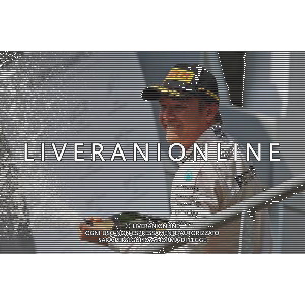 Race winner Nico Rosberg (GER) Mercedes AMG F1 celebrates with the champagne on the podium. 28.08.2016. Formula 1 World Championship, Rd 13, Belgian Grand Prix, Spa Francorchamps, Belgium, Race Day. / AGENZIA ALDO LIVERANI SAS - ITALY ONLY EDITORIAL USE ONLY