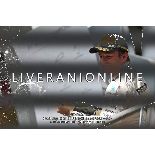 Race winner Nico Rosberg (GER) Mercedes AMG F1 celebrates with the champagne on the podium. 28.08.2016. Formula 1 World Championship, Rd 13, Belgian Grand Prix, Spa Francorchamps, Belgium, Race Day. / AGENZIA ALDO LIVERANI SAS - ITALY ONLY EDITORIAL USE ONLY