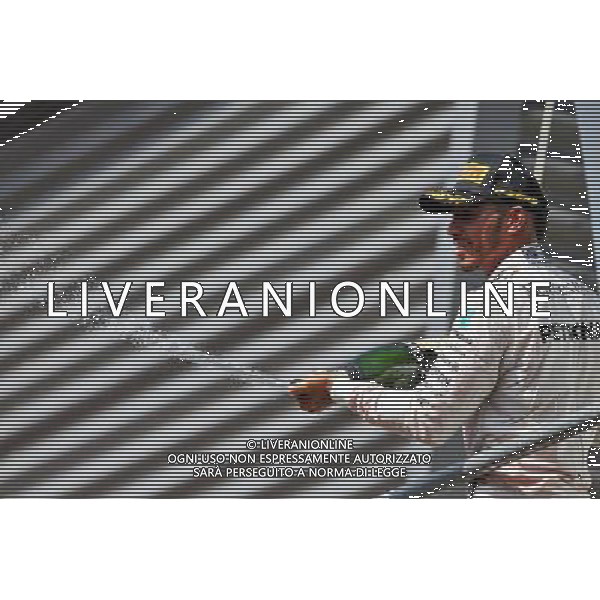 Lewis Hamilton (GBR) Mercedes AMG F1 celebrates his third position with the champagne on the podium. 28.08.2016. Formula 1 World Championship, Rd 13, Belgian Grand Prix, Spa Francorchamps, Belgium, Race Day. / AGENZIA ALDO LIVERANI SAS - ITALY ONLY EDITORIAL USE ONLY