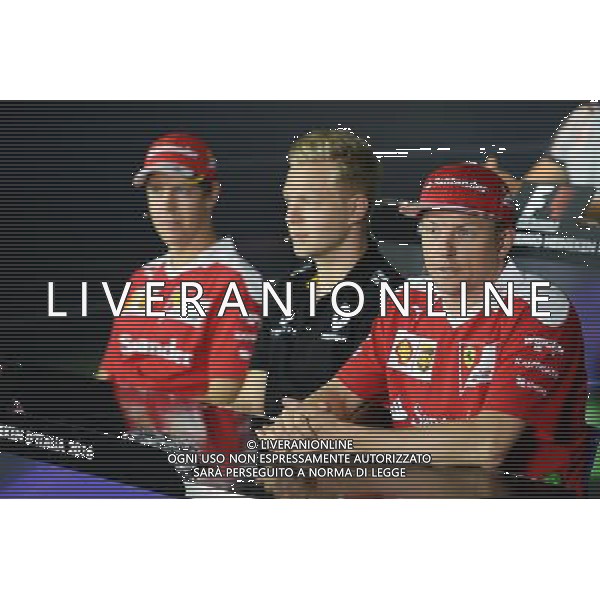 The FIA Press Conference (L to R): Sebastian Vettel (GER) Ferrari with Kevin Magnussen (DEN) Renault Sport F1 Team and Kimi Raikkonen (FIN) Ferrari. 01.09.2016. Formula 1 World Championship, Rd 14, Italian Grand Prix, Monza, Italy, Preparation Day. / AGENZIA ALDO LIVERANI SAS - ITALY ONLY EDITORIAL USE ONLY