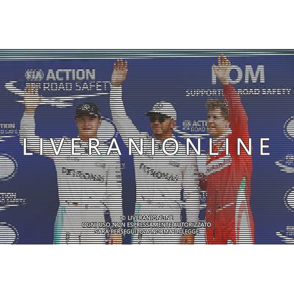 Qualifying top three in parc ferme (L to R): Nico Rosberg (GER) Mercedes AMG F1, second; Lewis Hamilton (GBR) Mercedes AMG F1, pole position; Sebastian Vettel (GER) Ferrari, third. 03.09.2016. Formula 1 World Championship, Rd 14, Italian Grand Prix, Monza, Italy, Qualifying Day. / AGENZIA ALDO LIVERANI SAS - ITALY ONLY EDITORIAL USE ONLY - PROVE UFFICIALI