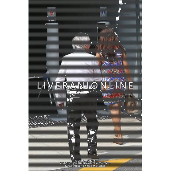Bernie Ecclestone (GBR) with wife Fabiana Flosi (BRA). 04.09.2016. Formula 1 World Championship, Rd 14, Italian Grand Prix, Monza, Italy, Race Day. / AGENZIA ALDO LIVERANI SAS - ITALY ONLY EDITORIAL USE ONLY