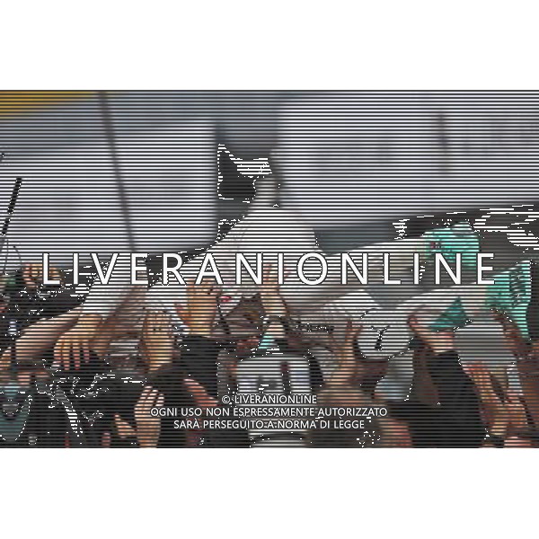 Race winner Nico Rosberg (GER) Mercedes AMG F1 celebrates with the team in parc ferme. 04.09.2016. Formula 1 World Championship, Rd 14, Italian Grand Prix, Monza, Italy, Race Day. / AGENZIA ALDO LIVERANI SAS - ITALY ONLY EDITORIAL USE ONLY