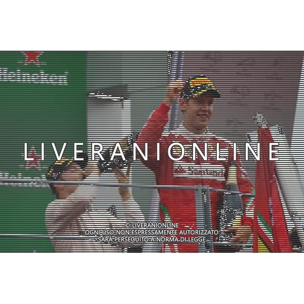 1st place Nico Rosberg (GER) Mercedes AMG Petronas F1 W07 and 3rd place Sebastian Vettel (GER) Scuderia Ferrari SF16-H. 04.09.2016. Formula 1 World Championship, Rd 14, Italian Grand Prix, Monza, Italy, Race Day. / AGENZIA ALDO LIVERANI SAS - ITALY ONLY EDITORIAL USE ONLY
