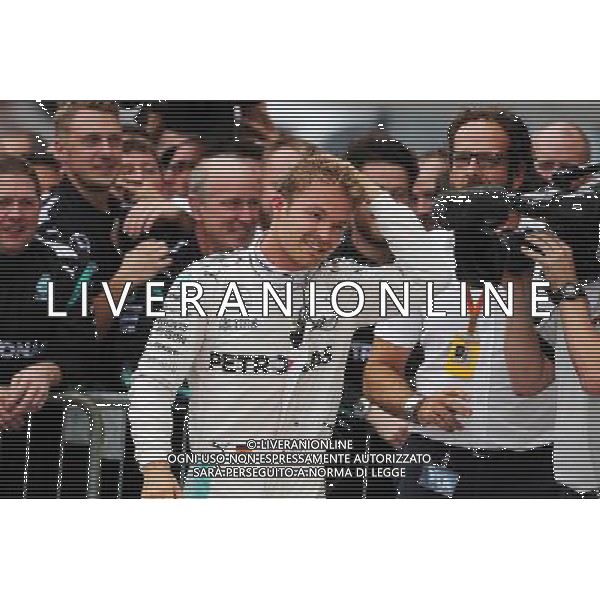 Race winner Nico Rosberg (GER) Mercedes AMG F1 celebrates with the team in parc ferme. 04.09.2016. Formula 1 World Championship, Rd 14, Italian Grand Prix, Monza, Italy, Race Day. / AGENZIA ALDO LIVERANI SAS - ITALY ONLY EDITORIAL USE ONLY