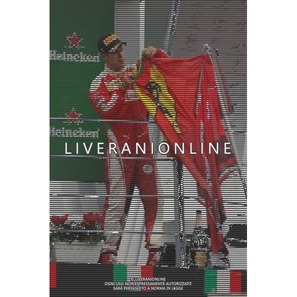 Sebastian Vettel (GER) Ferrari celebrates his third position on the podium. 04.09.2016. Formula 1 World Championship, Rd 14, Italian Grand Prix, Monza, Italy, Race Day. AG ALDO LIVERANI SAS ONLY ITALY