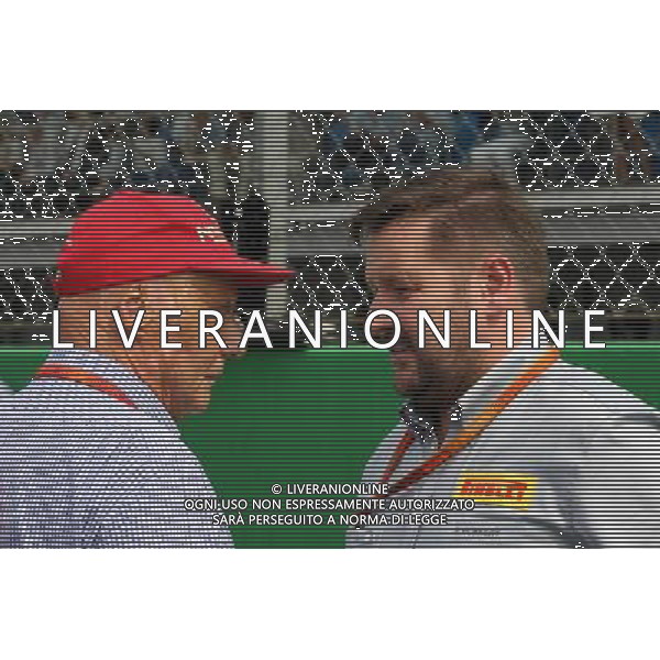 (L to R): Niki Lauda (AUT) Mercedes Non-Executive Chairman with Paul Hembery (GBR) Pirelli Motorsport Director. 04.09.2016. Formula 1 World Championship, Rd 14, Italian Grand Prix, Monza, Italy, Race Day. AG ALDO LIVERANI SAS ONLY ITALY
