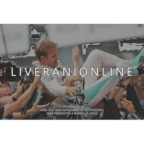 Race winner Nico Rosberg (GER) Mercedes AMG F1 celebrates with the team in parc ferme. 04.09.2016. Formula 1 World Championship, Rd 14, Italian Grand Prix, Monza, Italy, Race Day. AG ALDO LIVERANI SAS ONLY ITALY