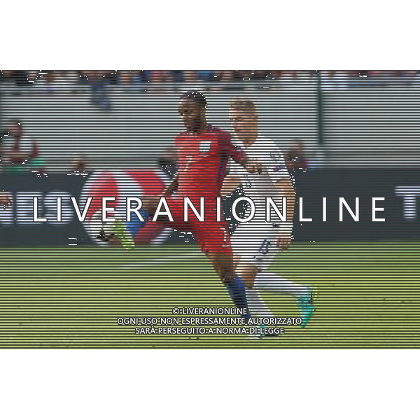 TRNAWA 04.09.2016 SPORT PILKA NOZNA ELIMINACJE DO MISTRZOSTW SWIATA ROSJA 2018 GRUPA F SLOWACJA - ANGLIA NZ. RAHEEM STERLING ENG TOMAS HUBOCAN SLO FOT. MICHAL CHWIEDUK / FOKUSMEDIA / NEWSPIX.PL TRNAVA 04.09.2016 SPORT FOOTBALL QUALIFICATION FOR THE WORLD CUP RUSSIA 2018 SLOVAKIA - ENGLAND FOT. MICHAL CHWIEDUK / FOKUSMEDIA / NEWSPIX.PL --- Newspix.pl AG ALDO LIVERANI SAS ONLY ITALY *** Local Caption *** www.newspix.pl mail us: info@newspix.pl call us: 0048 022 23 22 222 --- Polish Picture Agency by Ringier Axel Springer Poland