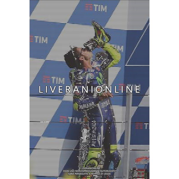 Misano Adriatico ( RN ) 11/09/16 Misano World Circuit Marco Simoncelli. Gran Premio TIM di San Marino e della Riviera di Rimini 2016 - MOTOGP Premiazione Nella foto: 2Â° Class. Valentino Rossi ( ITA ) su YAMAHA mentre festeggia sul podio PH Lauro Montagnini / AGENZIA ALDO LIVERANI SAS