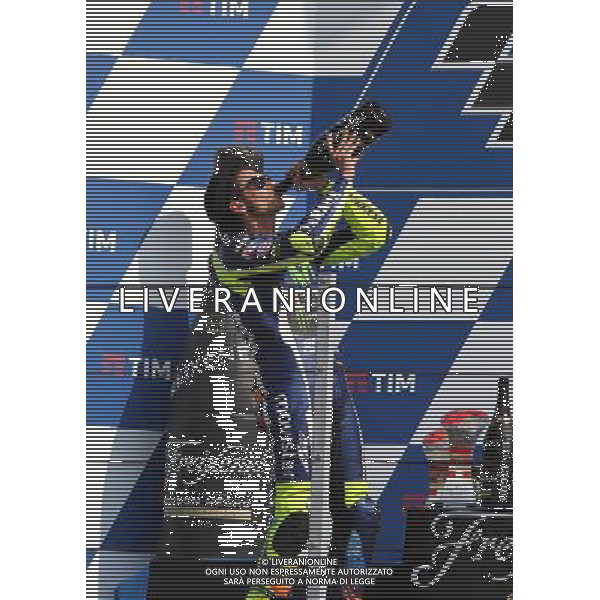 Misano Adriatico ( RN ) 11/09/16 Misano World Circuit Marco Simoncelli. Gran Premio TIM di San Marino e della Riviera di Rimini 2016 - MOTOGP Premiazione Nella foto: 2Â° Class. Valentino Rossi ( ITA ) su YAMAHA mentre festeggia sul podio PH Lauro Montagnini / AGENZIA ALDO LIVERANI SAS
