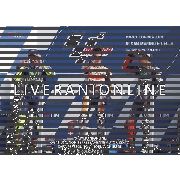 Misano Adriatico ( RN ) 11/09/16 Misano World Circuit Marco Simoncelli. Gran Premio TIM di San Marino e della Riviera di Rimini 2016 - MOTOGP Premiazione Nella foto: 2Â¡ Class. Valentino Rossi ( ITA ) su YAMAHA, il vincitore Dani Pedrosa ( ESP ) su HONDA e 3Â¡ Class. Jorge Lorenzo ( ESP ) su YAMAHA sul podio PH Lauro Montagnini / AGENZIA ALDO LIVERANI SAS