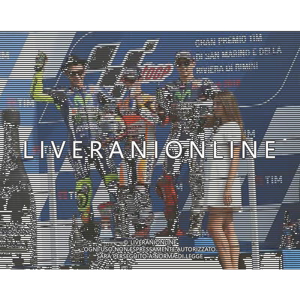 Misano Adriatico ( RN ) 11/09/16 Misano World Circuit Marco Simoncelli. Gran Premio TIM di San Marino e della Riviera di Rimini 2016 - MOTOGP Premiazione Nella foto: 2Â¡ Class. Valentino Rossi ( ITA ) su YAMAHA, il vincitore Dani Pedrosa ( ESP ) su HONDA e 3Â¡ Class. Jorge Lorenzo ( ESP ) su YAMAHA sul podio PH Lauro Montagnini / AGENZIA ALDO LIVERANI SAS