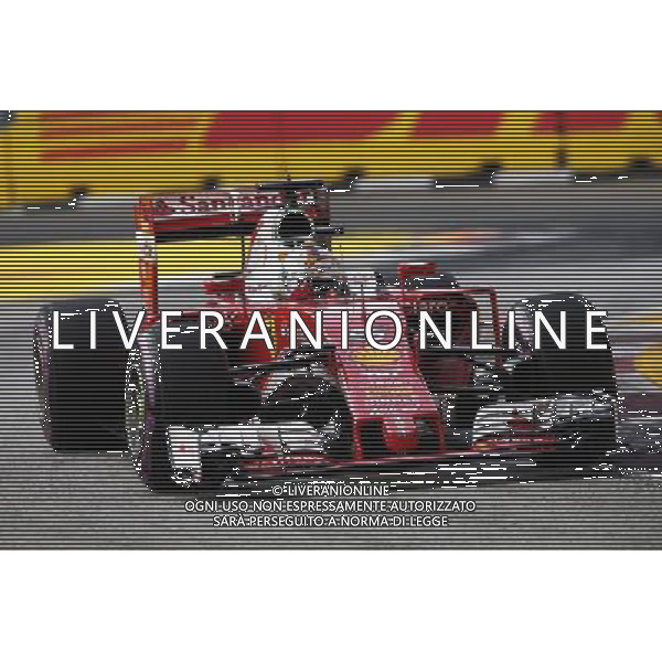 Sebastian Vettel (GER) Ferrari SF16-H. 17.09.2016. Formula 1 World Championship, Rd 15, Singapore Grand Prix, Marina Bay Street Circuit, Singapore, Qualifying Day. s / AGENZIA ALDO LIVERANI SAS - ITALY ONLY EDITORIAL USE ONLY