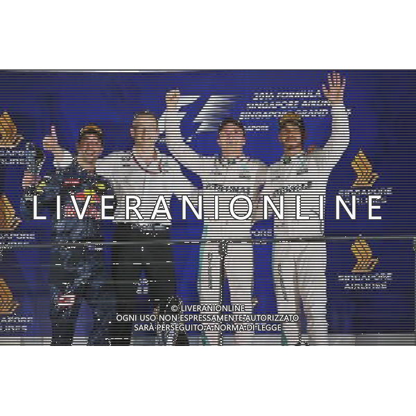 The podium (L to R): Daniel Ricciardo (AUS) Red Bull Racing, second; Nico Rosberg (GER) Mercedes AMG F1, race winner; Lewis Hamilton (GBR) Mercedes AMG F1, third. 18.09.2016. Formula 1 World Championship, Rd 15, Singapore Grand Prix, Marina Bay Street Circuit, Singapore, Race Day. / AGENZIA ALDO LIVERANI SAS - ITALY ONLY EDITORIAL USE ONLY
