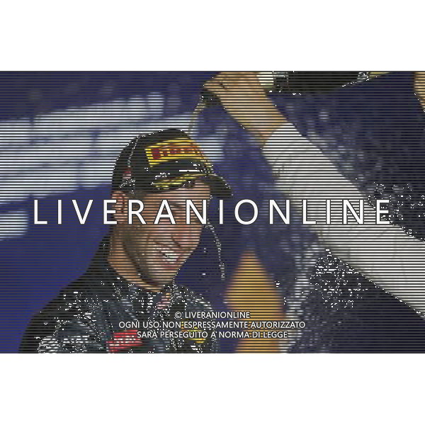 Daniel Ricciardo (AUS) Red Bull Racing celebrates his second position on the podium. 18.09.2016. Formula 1 World Championship, Rd 15, Singapore Grand Prix, Marina Bay Street Circuit, Singapore, Race Day. / AGENZIA ALDO LIVERANI SAS - ITALY ONLY EDITORIAL USE ONLY