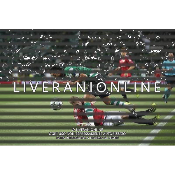 LIZBONA 27.09.2016 MECZ 2. KOLEJKA GRUPA F LIGA MISTRZOW SEZON 2016/17: SPORTING LIZBONA - LEGIA WARSZAWA --- UEFA CHAMPIONS LEAGUE GROUP F MATCH IN LISBON: SPORTING CLUBE DE PORTUGAL - LEGIA WARSAW BRYAN RUIZ THIBAULT MOULIN FOT. PIOTR KUCZA/NEWSPIX.PL --- Newspix.pl AG ALDO LIVERANI SAS ONLY ITALY *** Local Caption *** www.newspix.pl mail us: info@newspix.pl call us: 0048 022 23 22 222 --- Polish Picture Agency by Ringier Axel Springer Poland