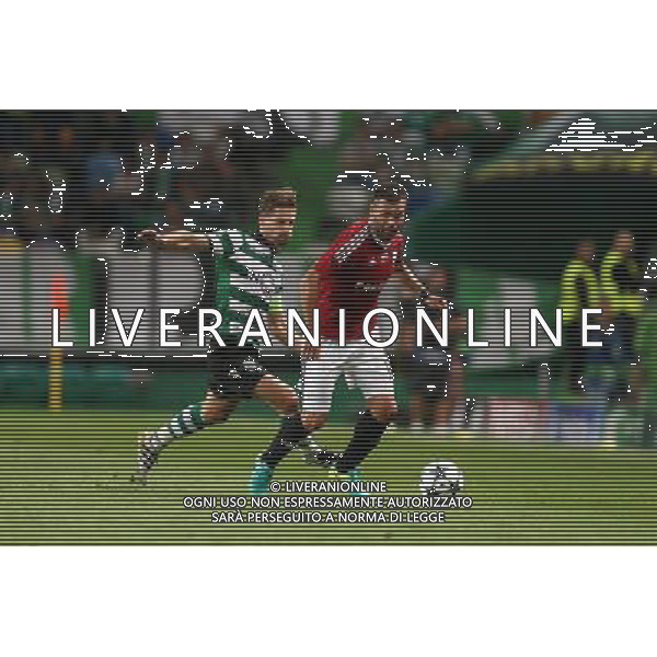 LIZBONA 27.09.2016 MECZ 2. KOLEJKA GRUPA F LIGA MISTRZOW SEZON 2016/17: SPORTING LIZBONA - LEGIA WARSZAWA --- UEFA CHAMPIONS LEAGUE GROUP F MATCH IN LISBON: SPORTING CLUBE DE PORTUGAL - LEGIA WARSAW ADREIN SILVA NEMANJA NIKOLIC FOT. PIOTR KUCZA/NEWSPIX.PL --- Newspix.pl AG ALDO LIVERANI SAS ONLY ITALY *** Local Caption *** www.newspix.pl mail us: info@newspix.pl call us: 0048 022 23 22 222 --- Polish Picture Agency by Ringier Axel Springer Poland