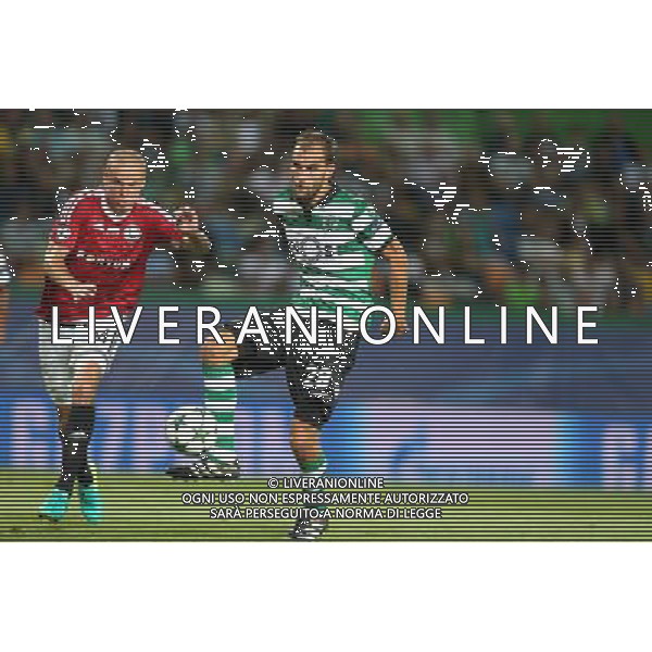 LIZBONA 27.09.2016 MECZ 2. KOLEJKA GRUPA F LIGA MISTRZOW SEZON 2016/17: SPORTING LIZBONA - LEGIA WARSZAWA --- UEFA CHAMPIONS LEAGUE GROUP F MATCH IN LISBON: SPORTING CLUBE DE PORTUGAL - LEGIA WARSAW ADAM HLOUSEK BAS DOST STRZELA GOLA FOT. PIOTR KUCZA/NEWSPIX.PL --- Newspix.pl AG ALDO LIVERANI SAS ONLY ITALY *** Local Caption *** www.newspix.pl mail us: info@newspix.pl call us: 0048 022 23 22 222 --- Polish Picture Agency by Ringier Axel Springer Poland