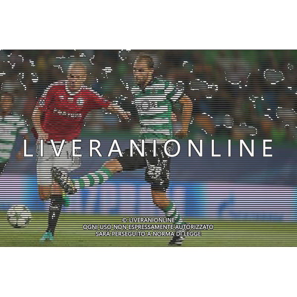 LIZBONA 27.09.2016 MECZ 2. KOLEJKA GRUPA F LIGA MISTRZOW SEZON 2016/17: SPORTING LIZBONA - LEGIA WARSZAWA --- UEFA CHAMPIONS LEAGUE GROUP F MATCH IN LISBON: SPORTING CLUBE DE PORTUGAL - LEGIA WARSAW ADAM HLOUSEK BAS DOST STRZELA GOLA FOT. PIOTR KUCZA/NEWSPIX.PL --- Newspix.pl AG ALDO LIVERANI SAS ONLY ITALY *** Local Caption *** www.newspix.pl mail us: info@newspix.pl call us: 0048 022 23 22 222 --- Polish Picture Agency by Ringier Axel Springer Poland