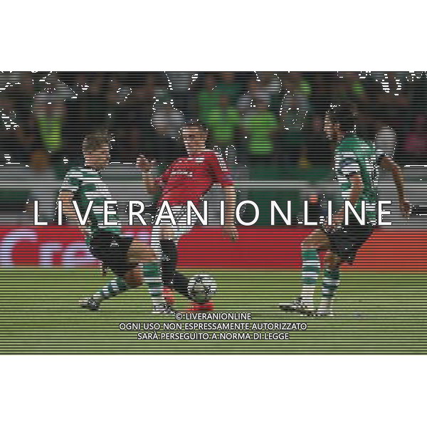 LIZBONA 27.09.2016 MECZ 2. KOLEJKA GRUPA F LIGA MISTRZOW SEZON 2016/17: SPORTING LIZBONA - LEGIA WARSZAWA --- UEFA CHAMPIONS LEAGUE GROUP F MATCH IN LISBON: SPORTING CLUBE DE PORTUGAL - LEGIA WARSAW ADREIN SILVA MIROSLAV RADOVIC BRYAN RUIZ FOT. PIOTR KUCZA/NEWSPIX.PL --- Newspix.pl AG ALDO LIVERANI SAS ONLY ITALY *** Local Caption *** www.newspix.pl mail us: info@newspix.pl call us: 0048 022 23 22 222 --- Polish Picture Agency by Ringier Axel Springer Poland