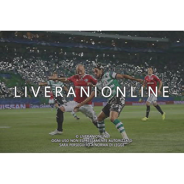 LIZBONA 27.09.2016 MECZ 2. KOLEJKA GRUPA F LIGA MISTRZOW SEZON 2016/17: SPORTING LIZBONA - LEGIA WARSZAWA --- UEFA CHAMPIONS LEAGUE GROUP F MATCH IN LISBON: SPORTING CLUBE DE PORTUGAL - LEGIA WARSAW JAKUB CZERWINSKI BRYAN RUIZ FOT. PIOTR KUCZA/NEWSPIX.PL --- Newspix.pl AG ALDO LIVERANI SAS ONLY ITALY *** Local Caption *** www.newspix.pl mail us: info@newspix.pl call us: 0048 022 23 22 222 --- Polish Picture Agency by Ringier Axel Springer Poland