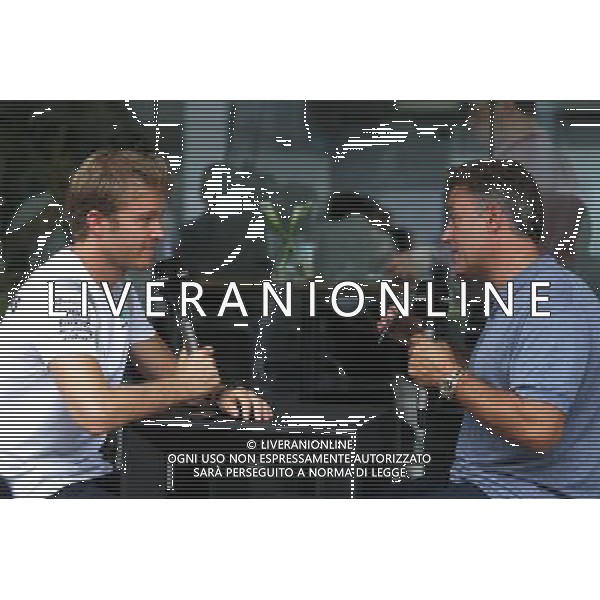 (L to R): Nico Rosberg (GER) Mercedes AMG F1 with Jean Alesi (FRA) Canal+ Presenter. 29.09.2016. Formula 1 World Championship, Rd 16, Malaysian Grand Prix, Sepang, Malaysia, Thursday. / AGENZIA ALDO LIVERANI SAS - ITALY ONLY EDITORIAL USE ONLY
