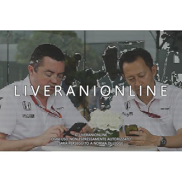 (L to R): Eric Boullier (FRA) McLaren Racing Director with Yusuke Hasegawa (JPN) Head of Honda F1 Programme. 29.09.2016. Formula 1 World Championship, Rd 16, Malaysian Grand Prix, Sepang, Malaysia, Thursday. / AGENZIA ALDO LIVERANI SAS - ITALY ONLY EDITORIAL USE ONLY