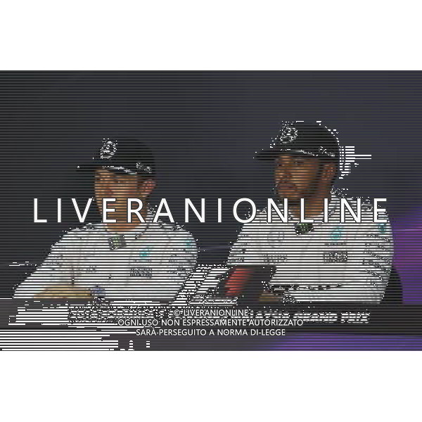 (L to R): Nico Rosberg (GER) Mercedes AMG F1 and team mate Lewis Hamilton (GBR) Mercedes AMG F1 in the FIA Press Conference. 01.10.2016. Formula 1 World Championship, Rd 16, Malaysian Grand Prix, Sepang, Malaysia, Saturday. - www.xpbimages.com, EMail: requests@xpbimages.com - copy of publication required for printed pictures. Every used picture is fee-liable. Â© Copyright: Moy / XPB ImagesONLY ITALY/EDITORIAL USE ONLY/Agenzia Aldo Liverani s.a.s.